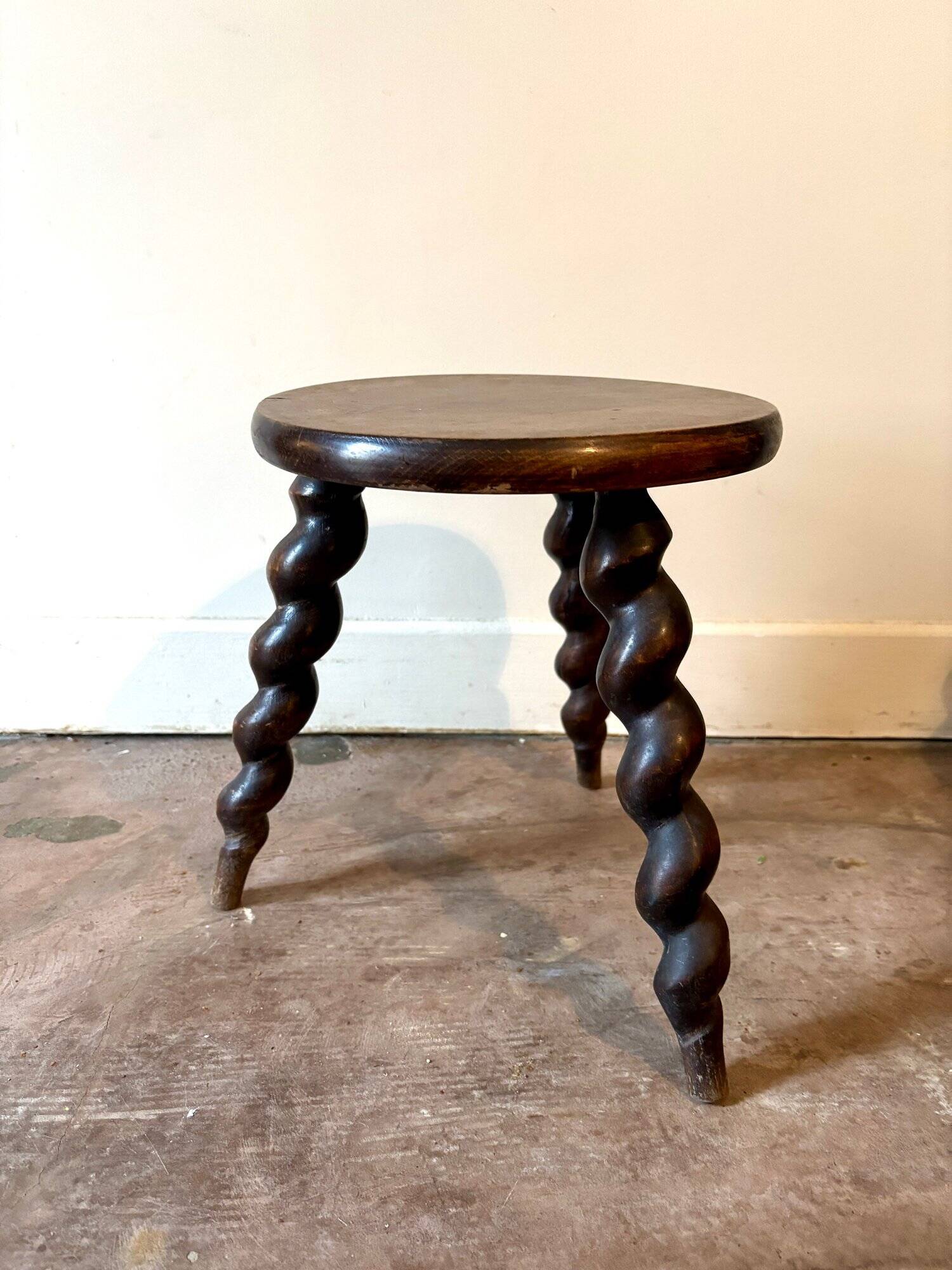 Turned wooden tripod stool
