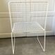 Chaise métal grillagée