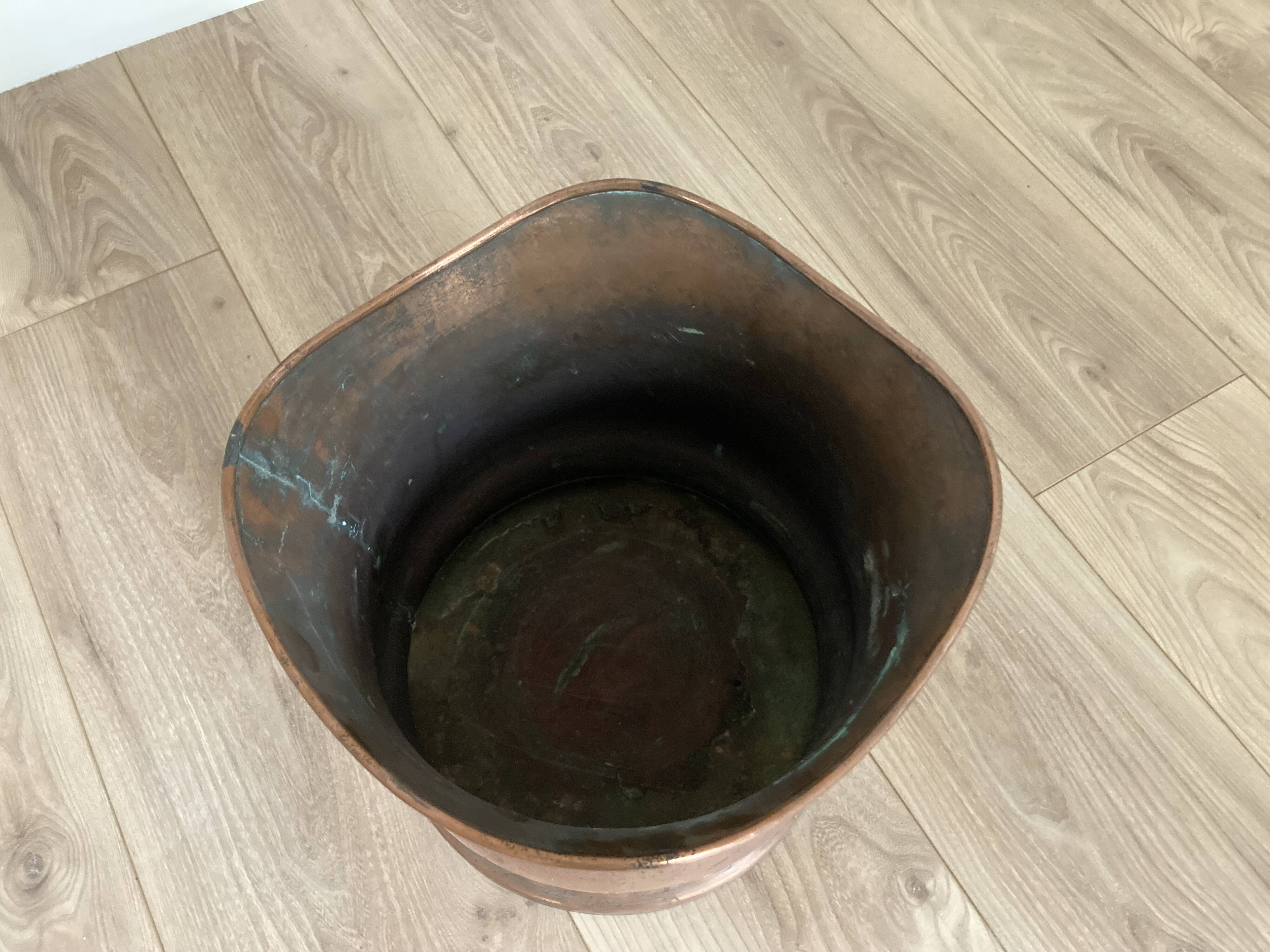 Old copper pot cover