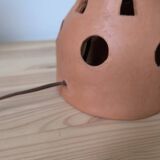Openwork terracotta table lamp