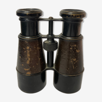 Old pair of XXth leather-wrapped binoculars