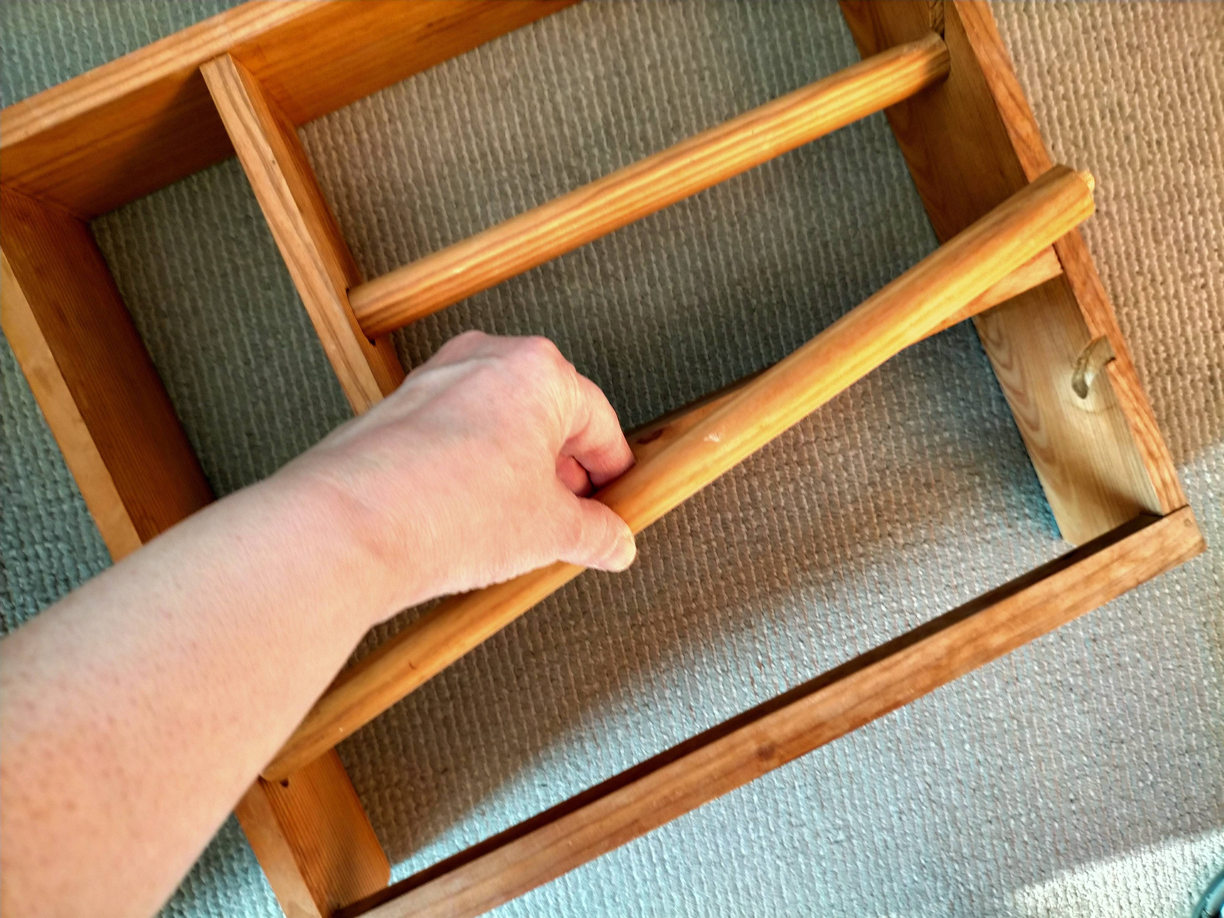 Wooden shelf with unroller wipes everything