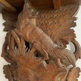 Black Forest carved wooden wall console, harness with wolf decoration