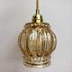 Vintage amber glass globe hand lamp