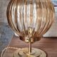 Globe table lamp in amber chiseled glass