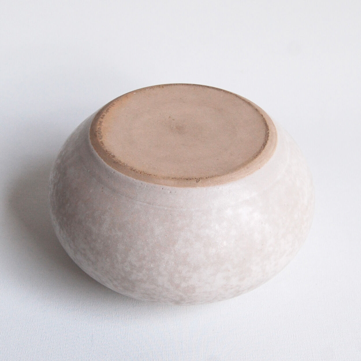 Vintage white ceramic ball vase