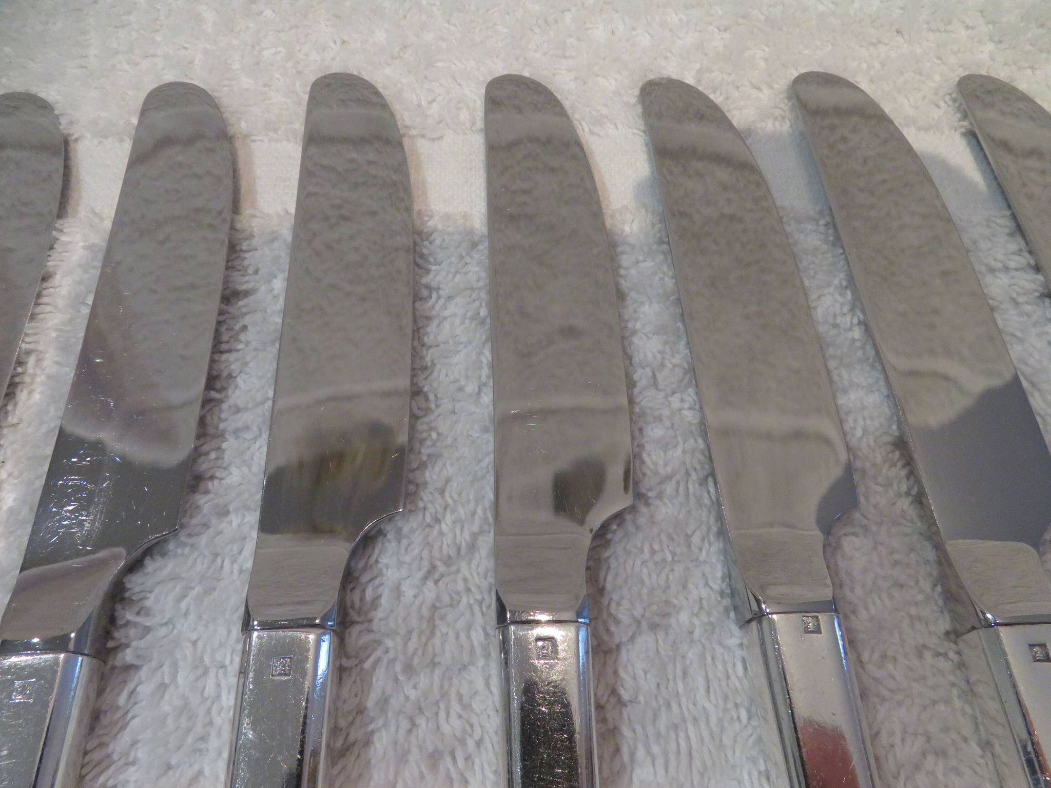 12 Christofle Concorde silver plated dessert knives, 19cm