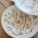 4 vintage deep plates with a brown floral design