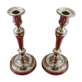 2 candlesticks with a chiseled floral decoration
