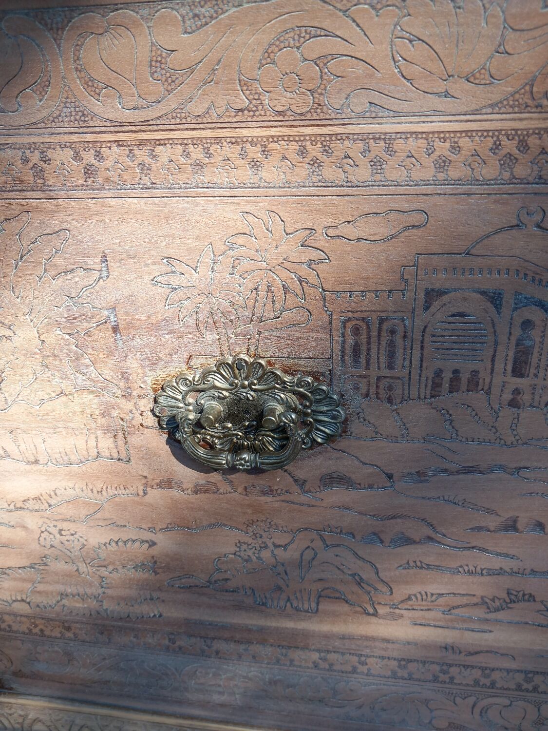 Antique carved wooden chest