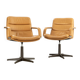 Pair of swivel armchairs by Geoffrey Harcourt.