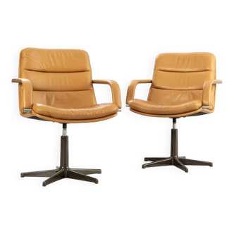 Pair of swivel armchairs by Geoffrey Harcourt.