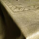 Old linen tablecloth and evening tinted in vermeil