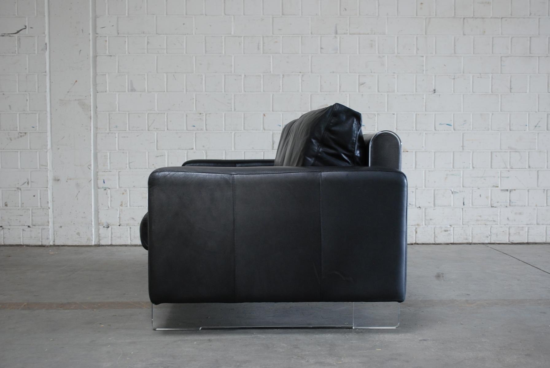 Vintage black leather sofa from Lavalina
