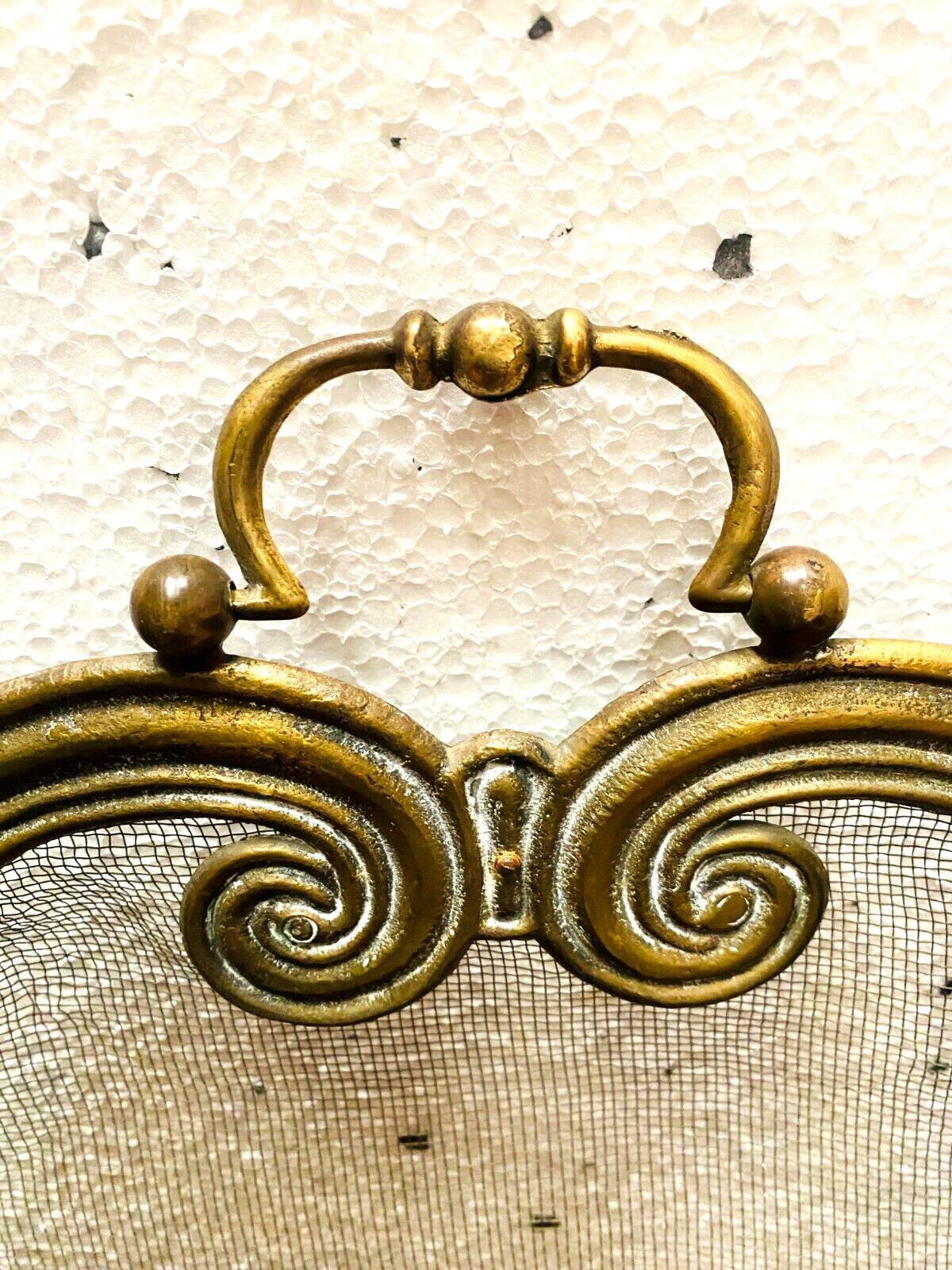 Spark screen has four sheets in brass and braided mesh XX century