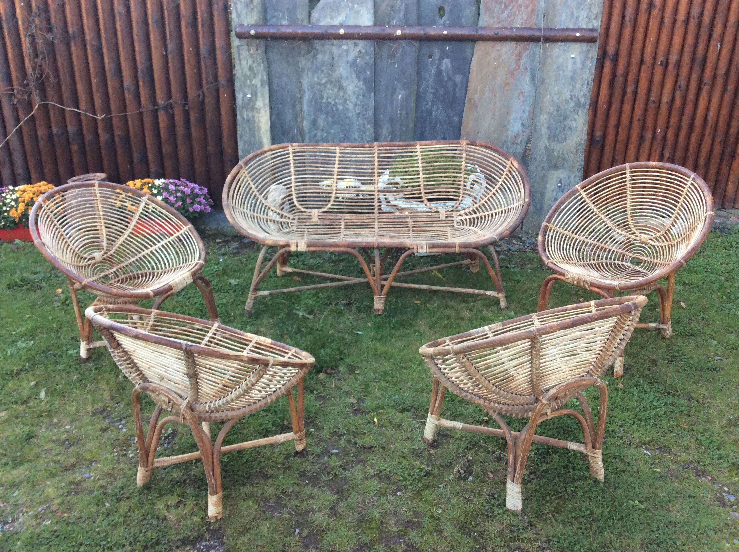 Set of 4 armchairs and 1 vintage rattan bench (5 pieces) inseparable.