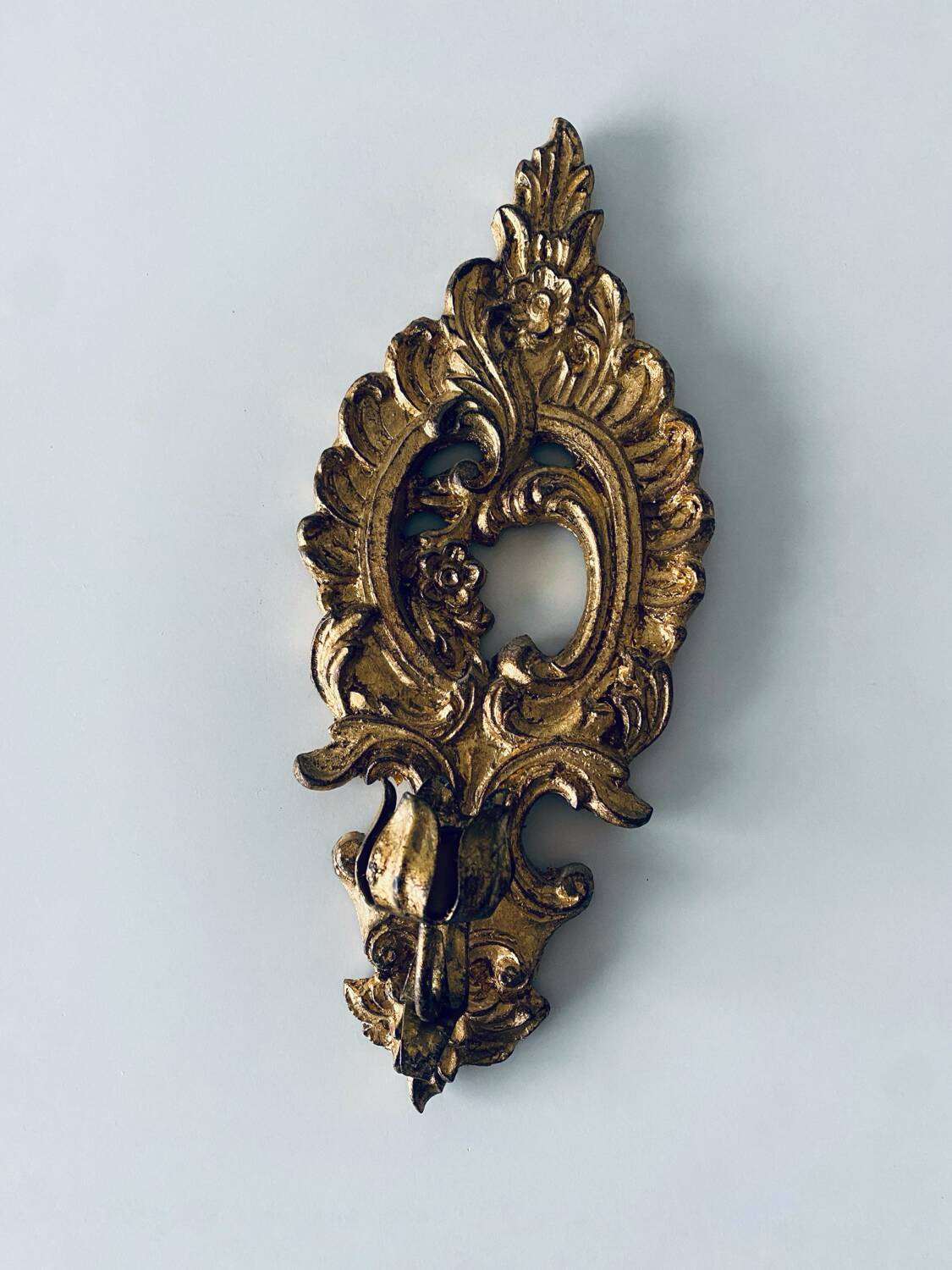 Gold wall candle holder