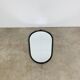 Oval mirror from the 1950s, wrought iron and brass.
