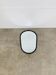 Oval mirror from the 1950s, wrought iron and brass.