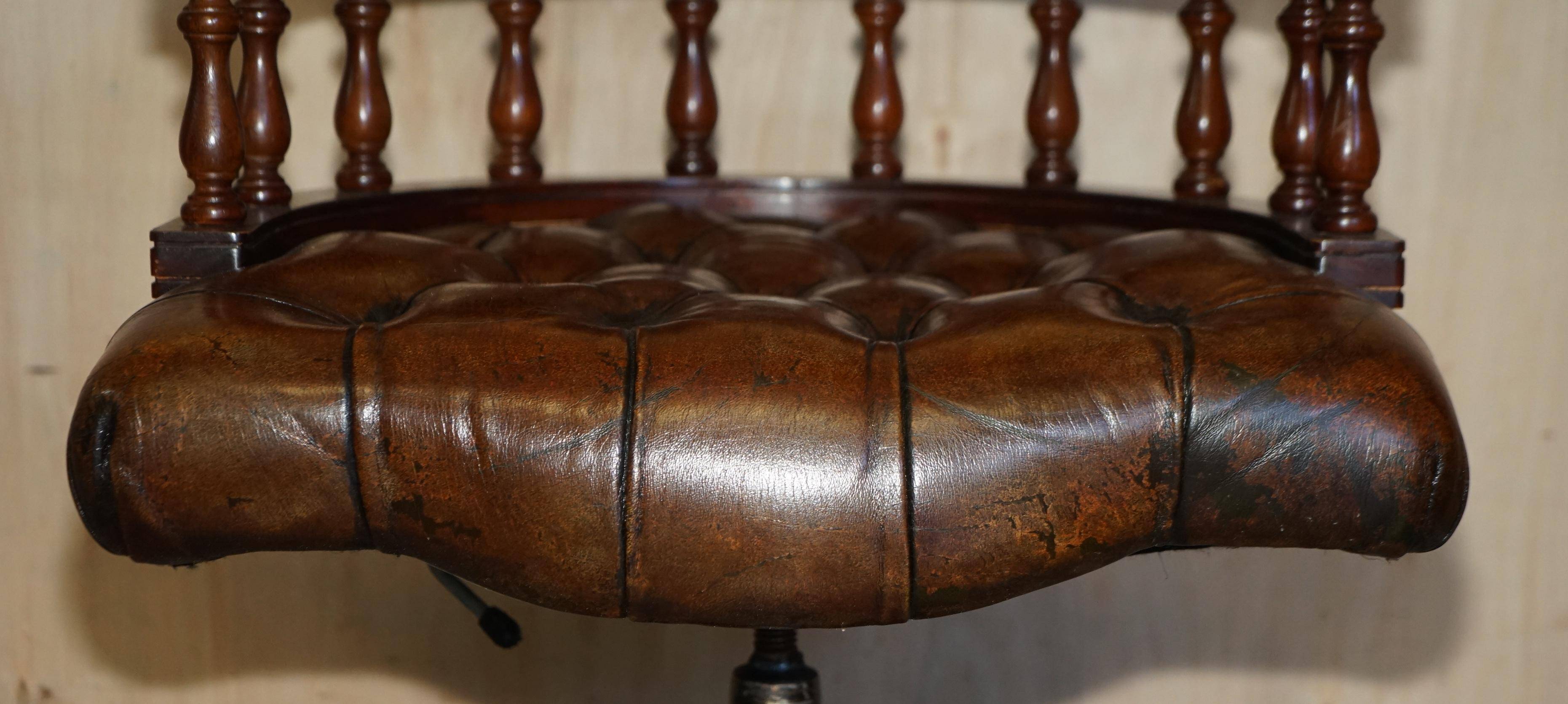 Vintage Chesterfield captain's chair in leather