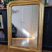 Old Louis Phillipe mercury mirror in gilded stucco with leaf