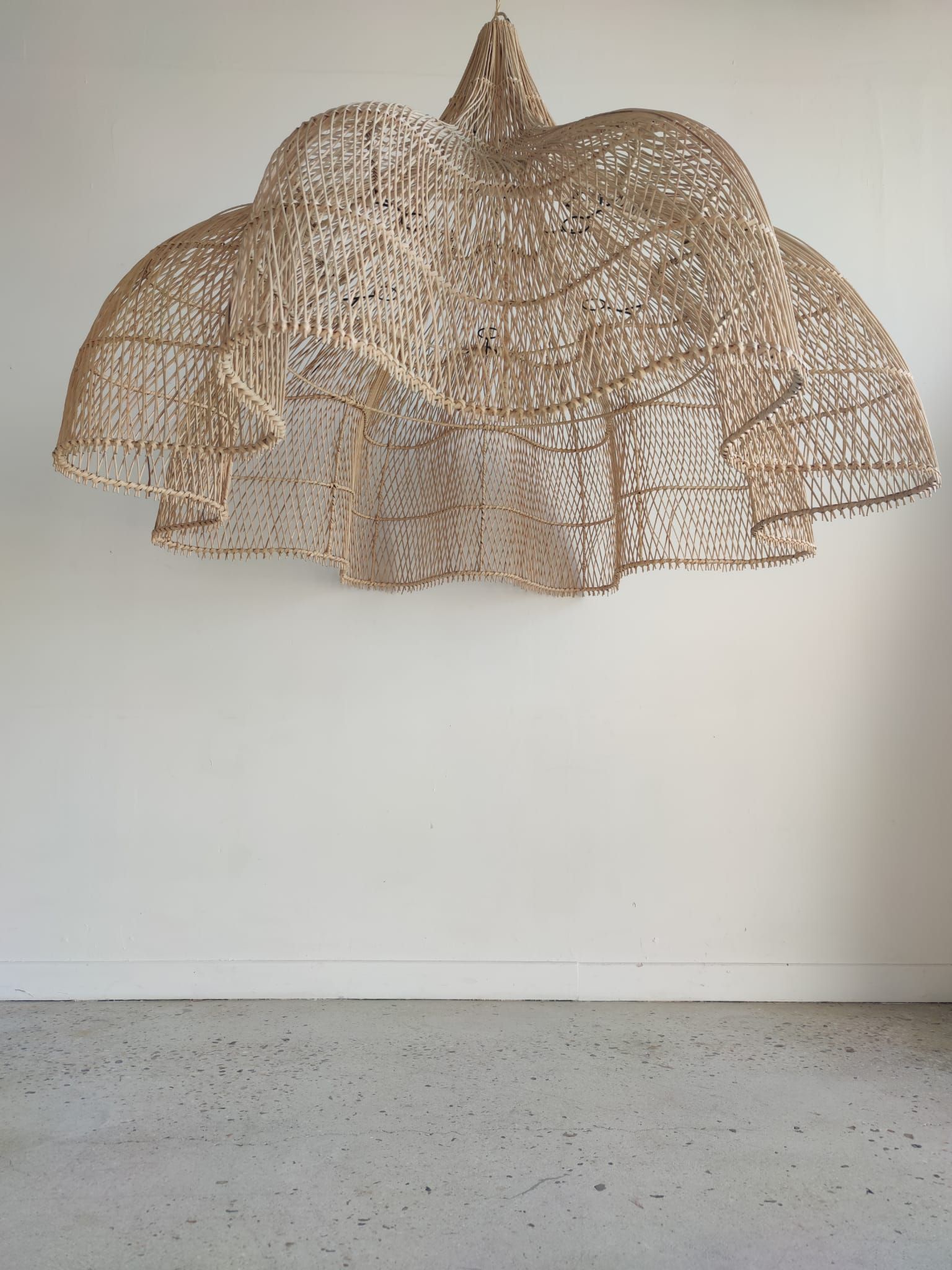 Huge rattan suspension in the shape of a corolla H:1m; D: 1m50