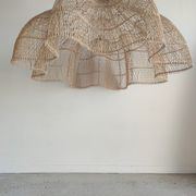 Huge rattan suspension in the shape of a corolla H:1m; D: 1m50