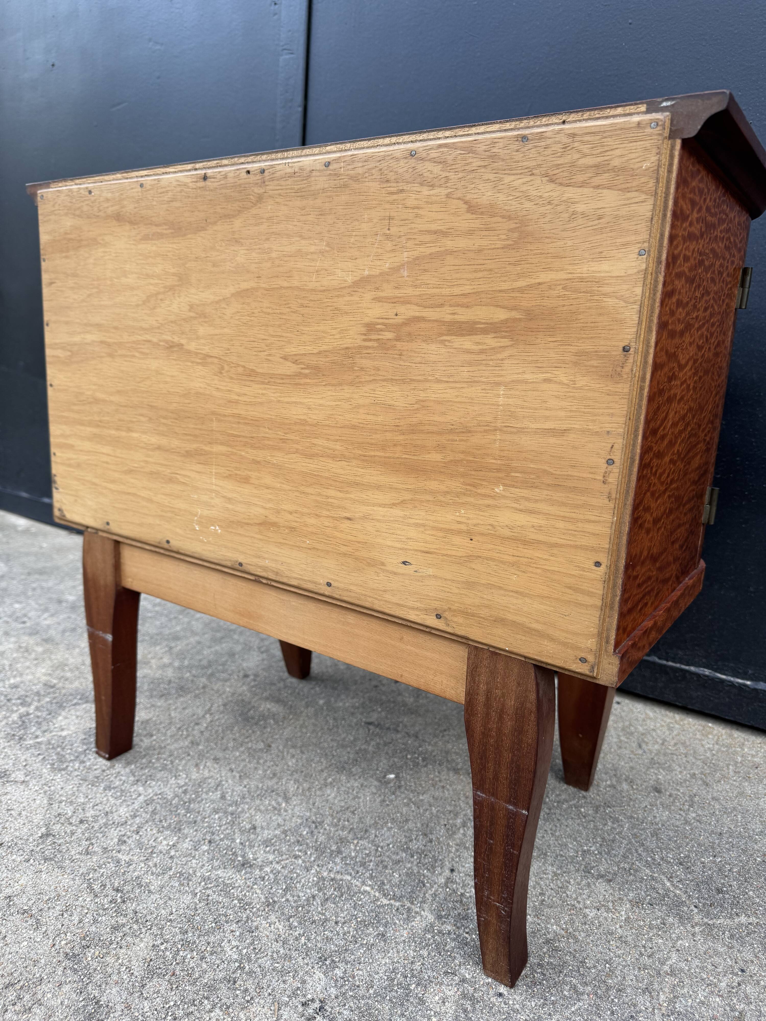 Mahogany veneered bedside table from the 1950s.