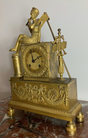 Period clock restoration XIXth in gilded bronze