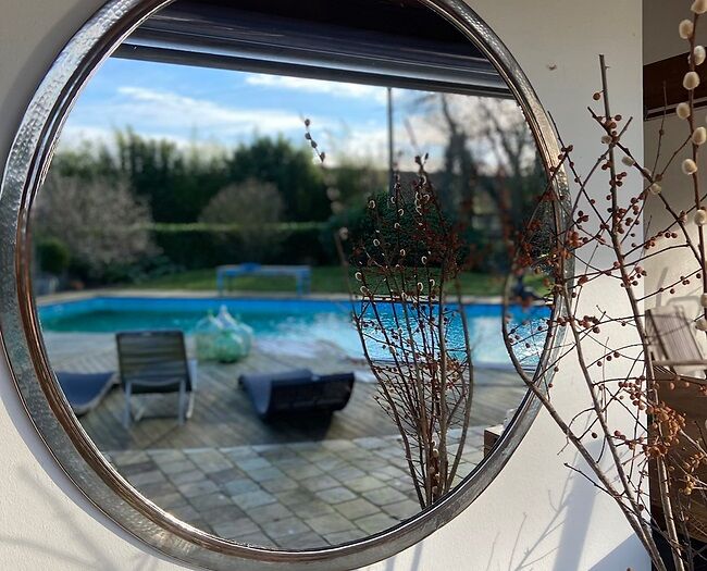 Hammered metal round mirror