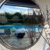 Hammered metal round mirror