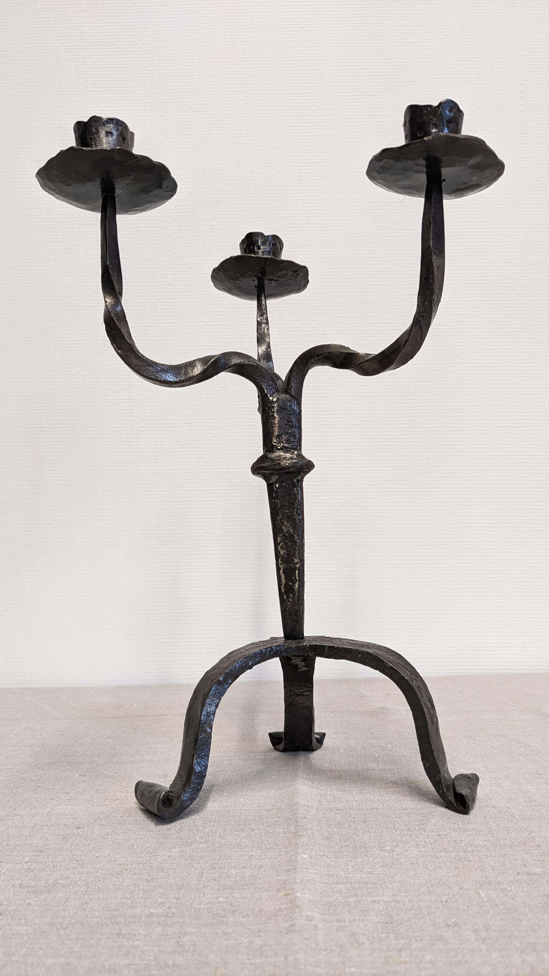 Brutalist candelabrum with 3 lights in wrought iron, France circa 1950.