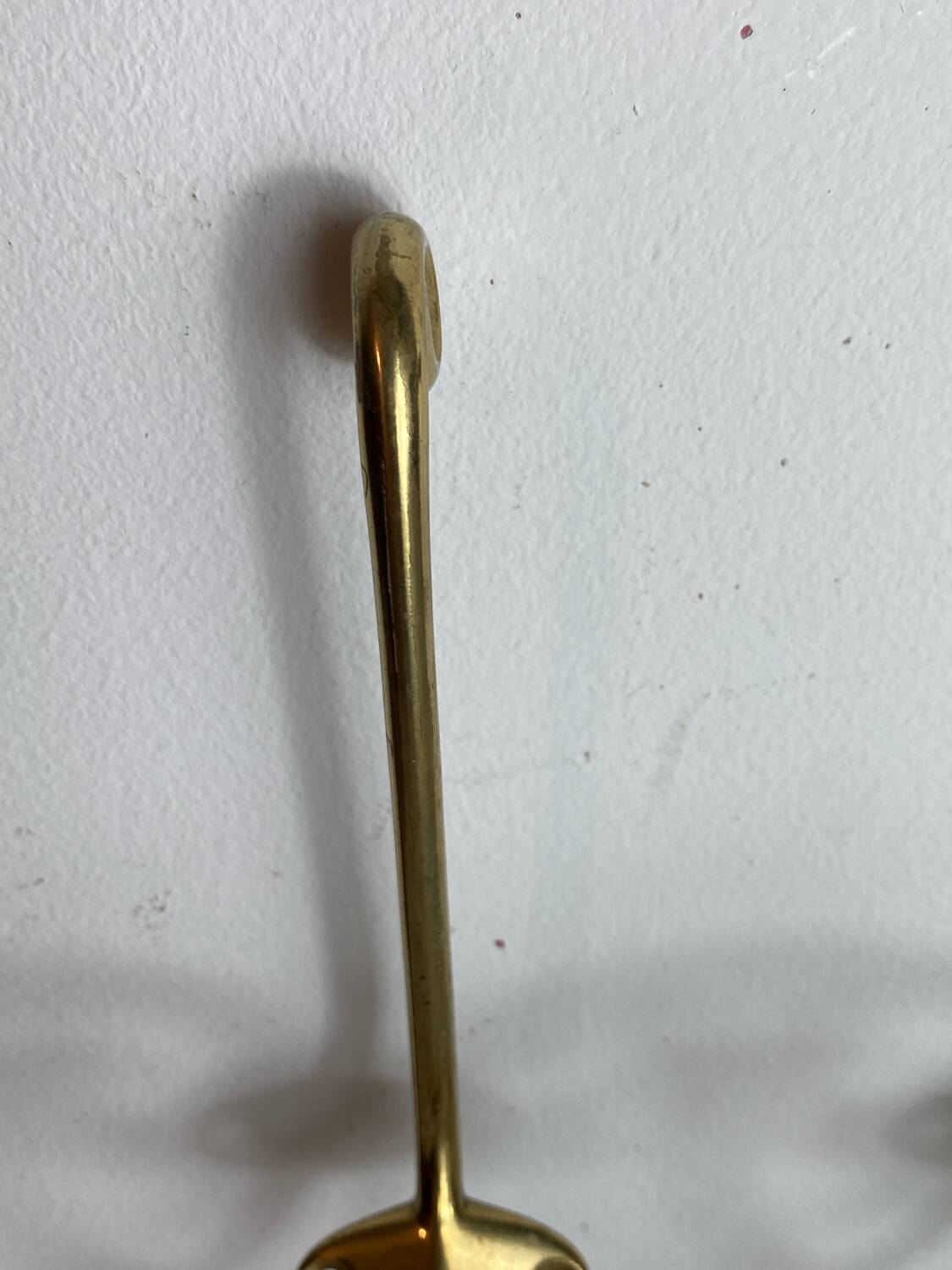 Pair of brass hooks
