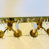 Pair of gilt bronze wall sconces with pendants from the mid-20th century.