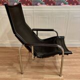 Black leather reclining lounge chair, "Hans Eichenberger" design, 1960.