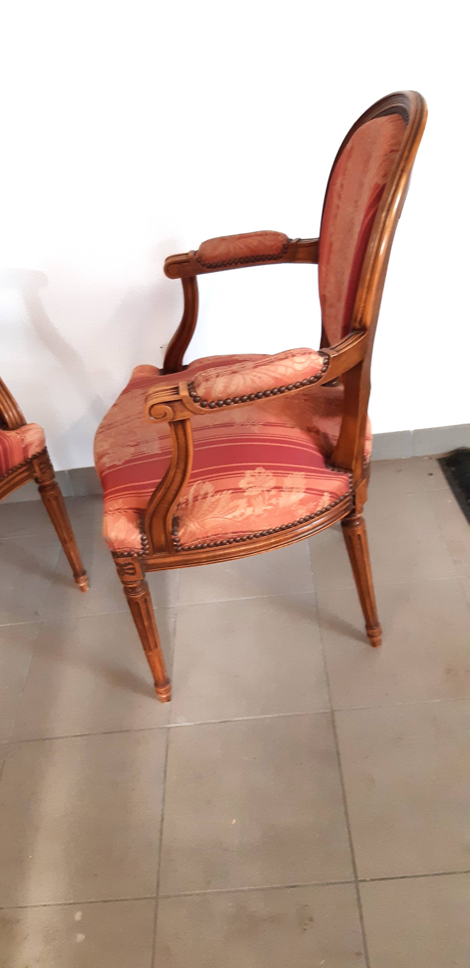 Pair of Louis XVI style cabriolet armchairs with medallion