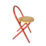 Vintage folding chair in red painted metal and wood