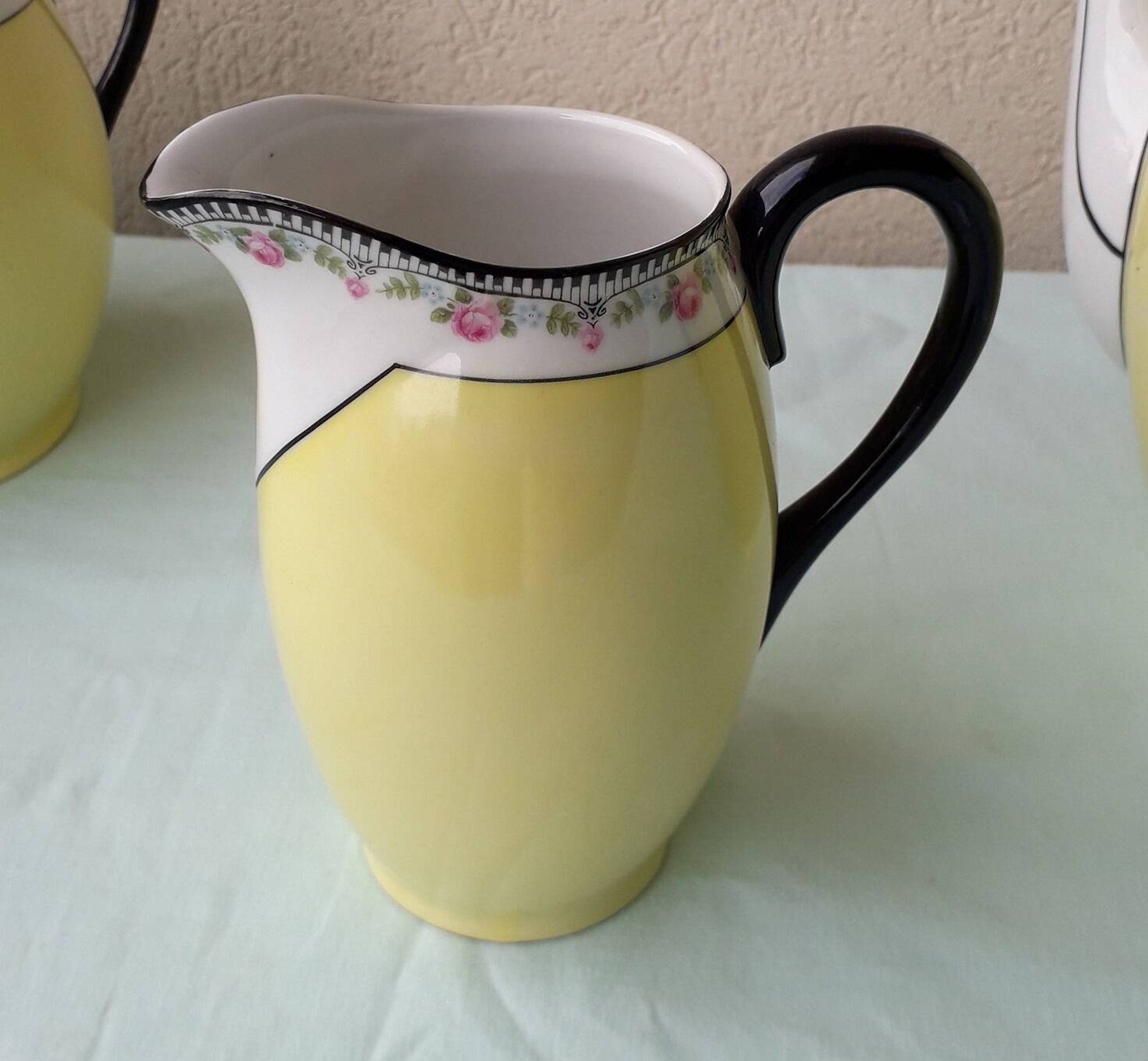 Sugar bowl and milk jug in porcelain