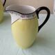 Sugar bowl and milk jug in porcelain