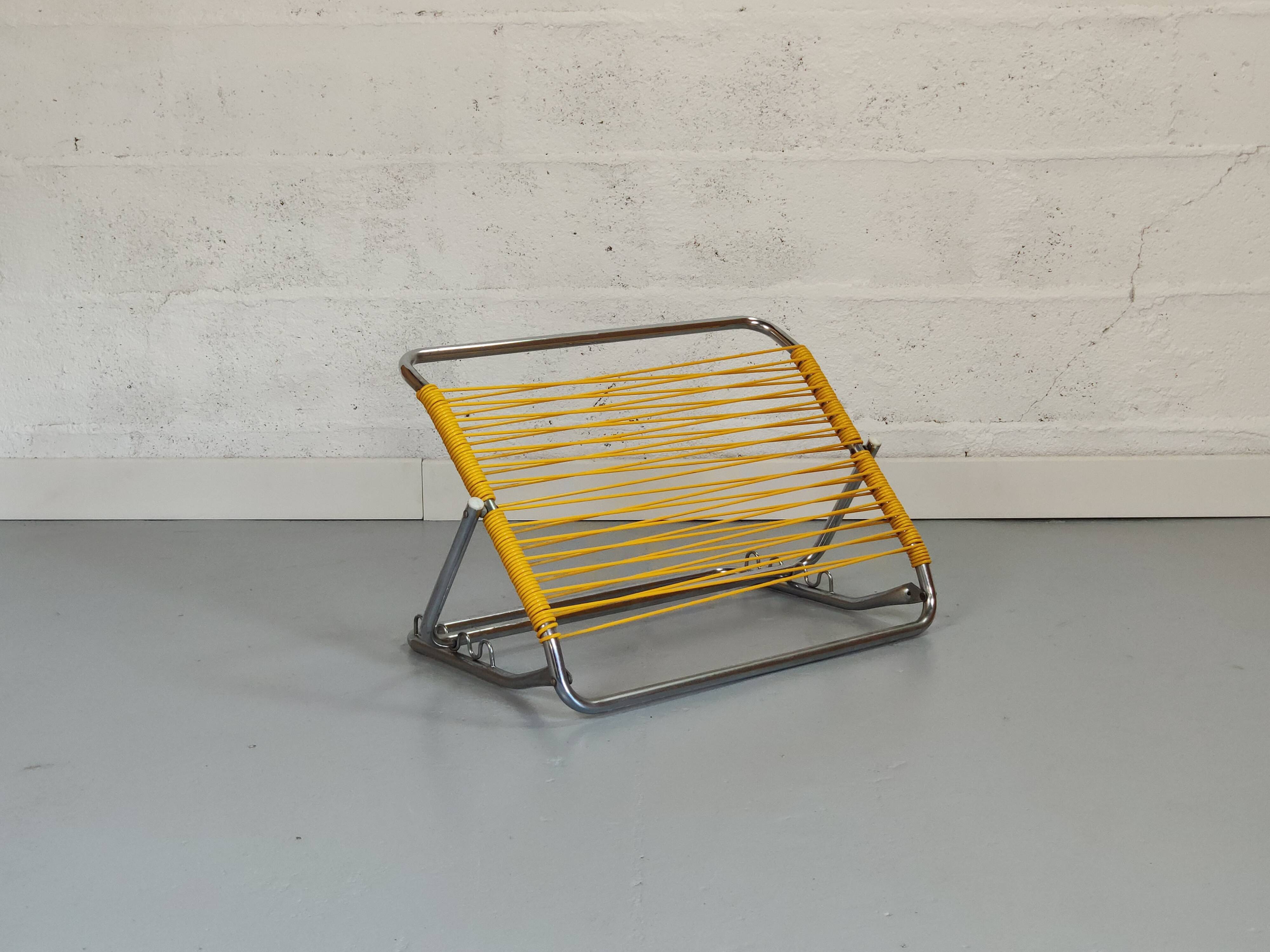 Yellow scoubidou head rest and vintage chrome metal