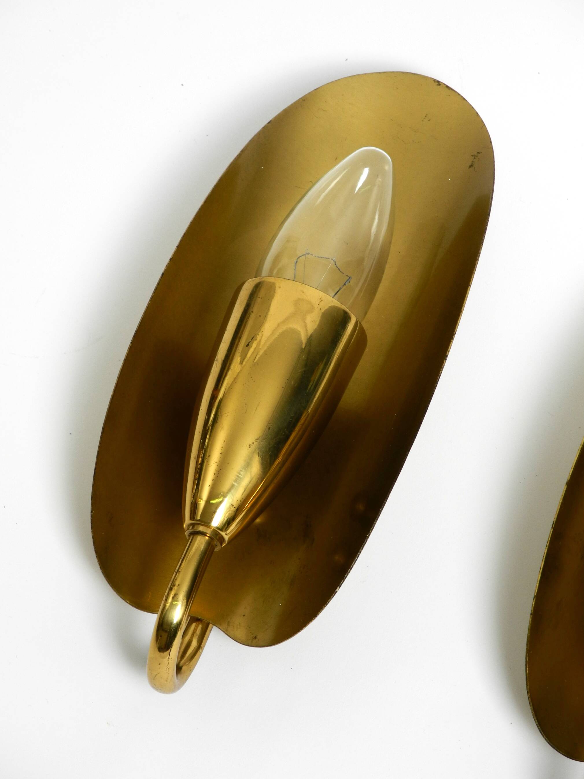 Two magical original Mid Century Modern bag brass wall lamps