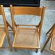 Suite de 4 chaises pliantes cannées 80’s