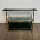 Brass magazine rack and blue-tinted glasses