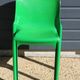 Set of 4 green Selene Magistretti chairs.