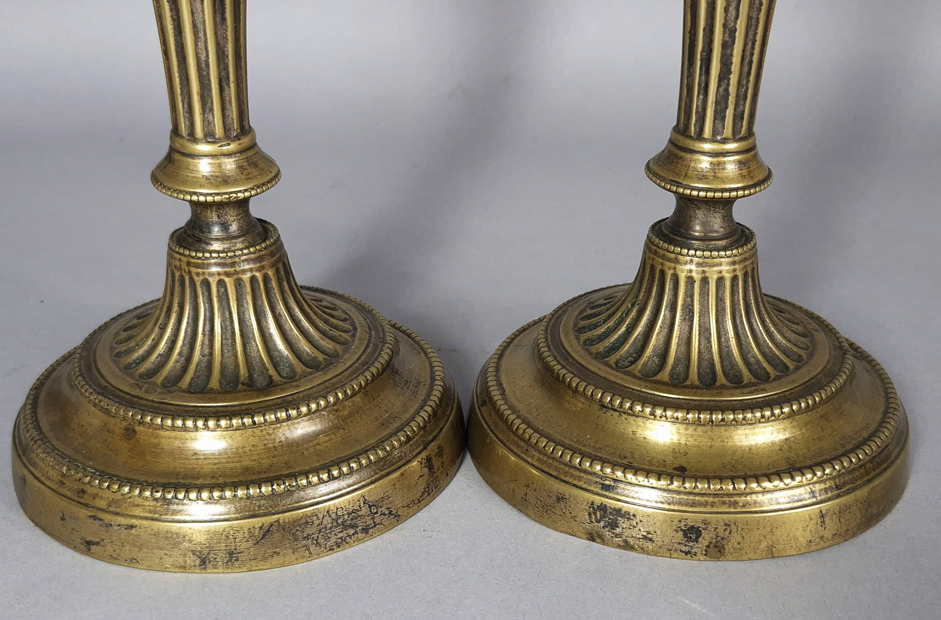 Pair of fluted bronze candlesticks Louis XVI period 27 cm