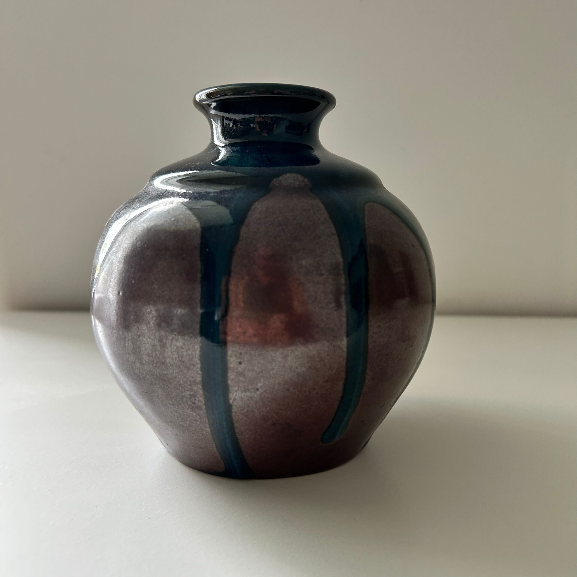Ink blue round vase and bronze