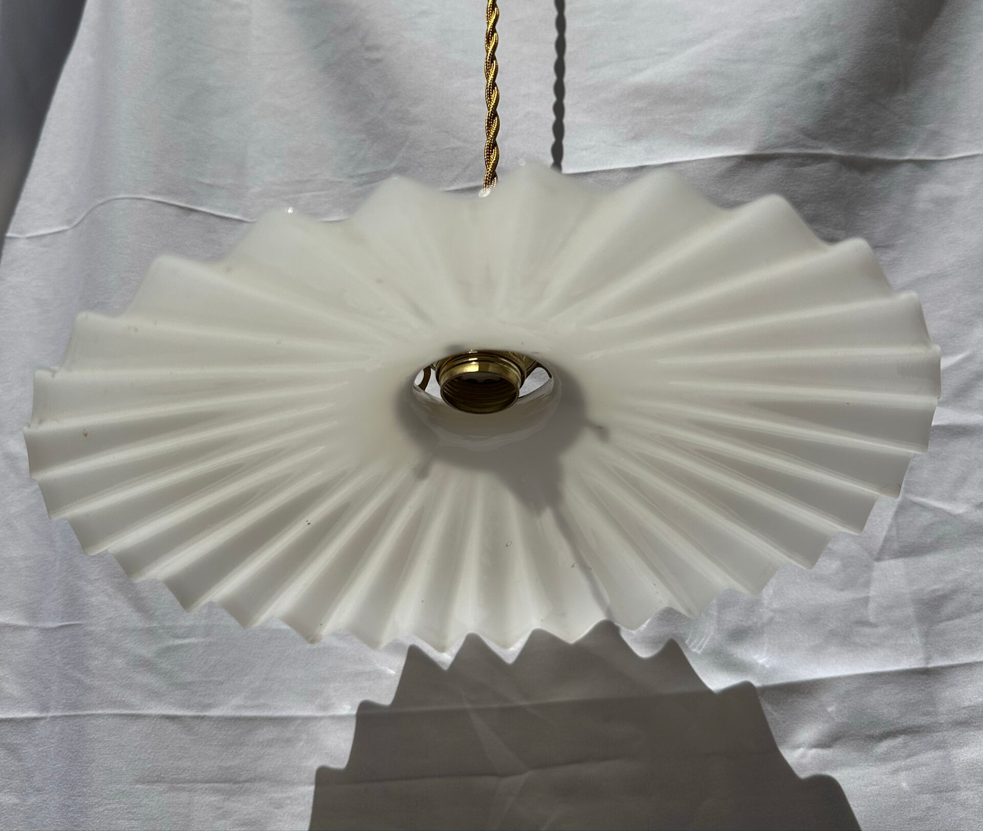 Vintage suspension opaline pleated lampshade with golden threads and claw socket.