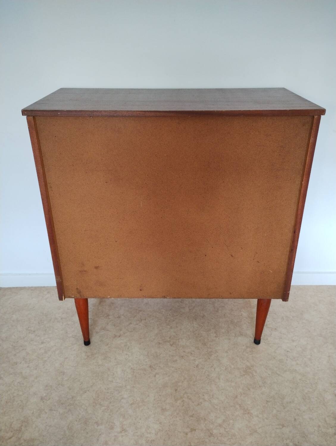 Chest of drawers with spindle legs