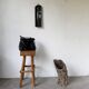 Brutalist hammered mirror, free-form, patinated metal.