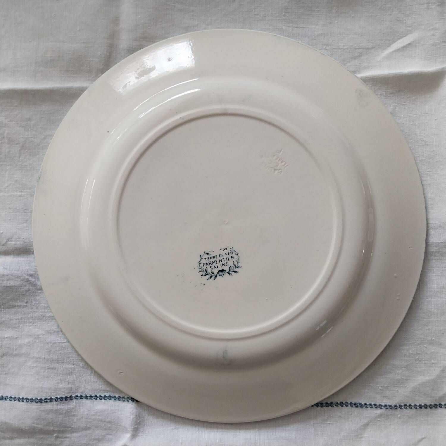 Old large iron earth dish Parmentier Salins